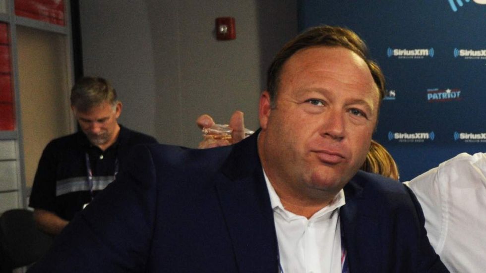 Alex Jones claims he is ‘very critical’ of Trump