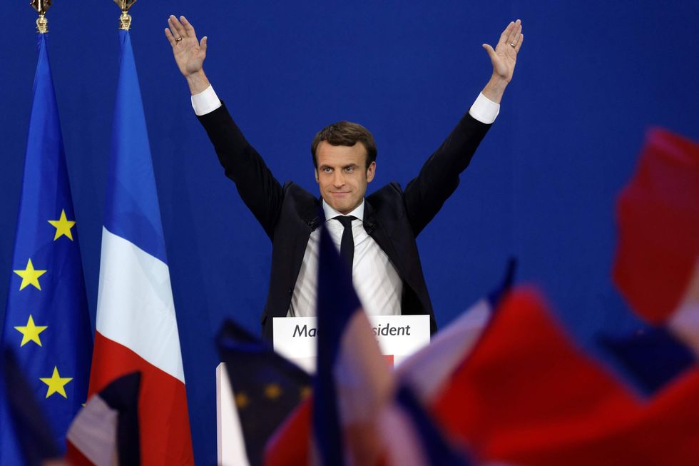 Emmanuel Macron defeats Marine Le Pen in French presidential election with landslide victory