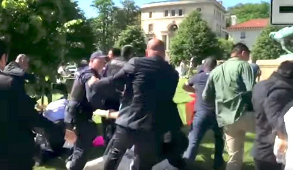 New video shows what the president of Turkey was doing as his goons beat up Americans