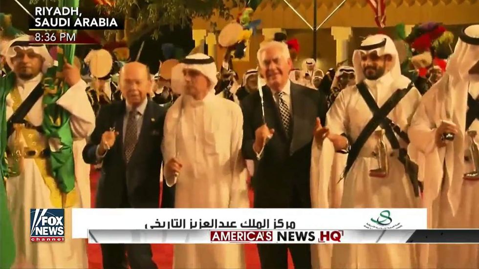 Watch: Secs. Ross, Tillerson dance with swords at Saudi welcome party — then Trump joins in