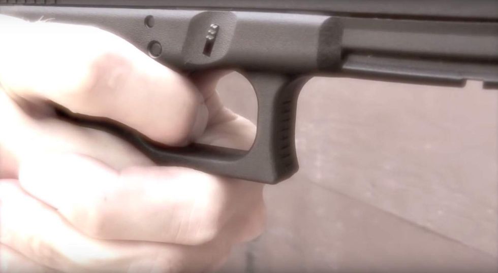 Suspected armed robber breaks into home, threatens teen. But Dad pulls out handgun and takes aim.