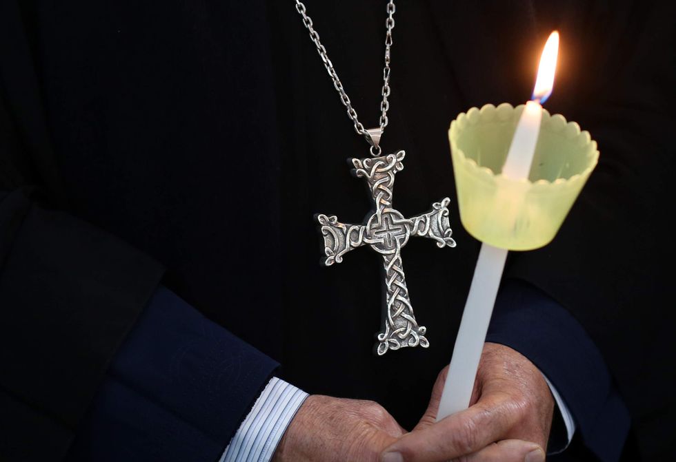 Masked militants in Egypt kill 26 Coptic Christians, many of them children