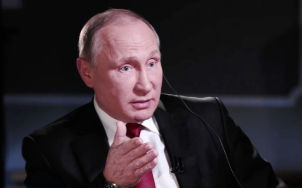Putin cites conspiracy theory to explain who could have framed Russia in hacking