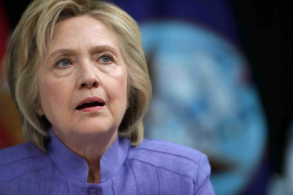 Vandals troll Hillary Clinton by adding three letters to highway sign
