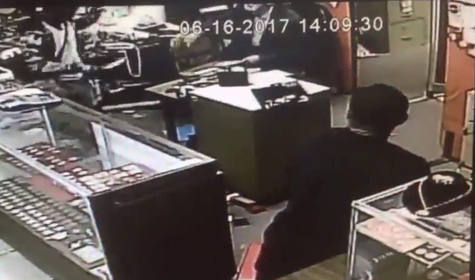 91-year-old store owner held up by armed robbers. But he's not about to let them go without a fight.