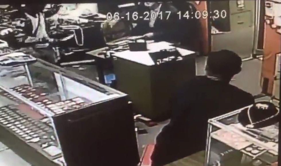 91-year-old store owner held up by armed robbers. But he's not about to let them go without a fight.