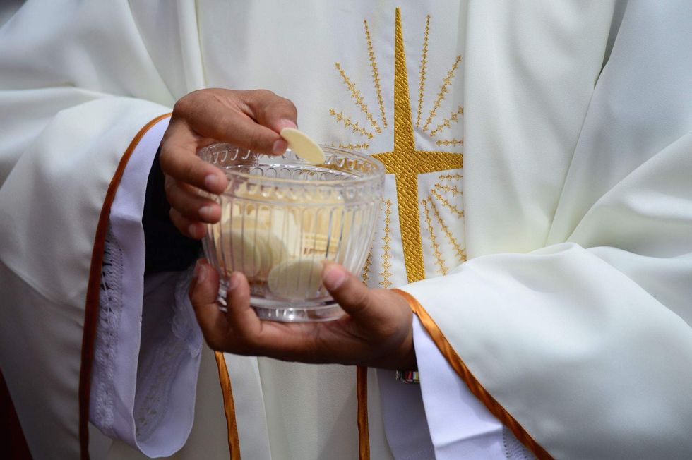 Catholic bishop writes decree barring same-sex couples from receiving Holy Communion, funeral rites
