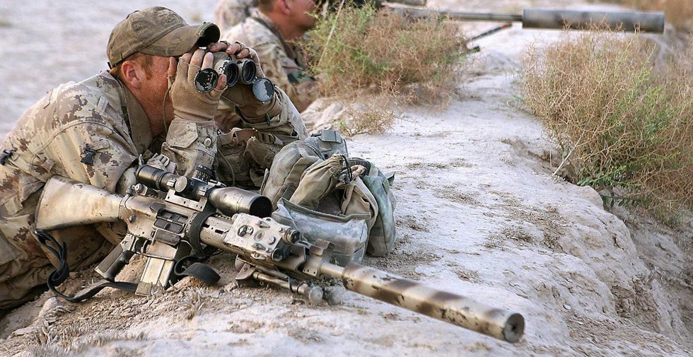 Record-setting Canadian sniper also thwarted oncoming ISIS attack, official says