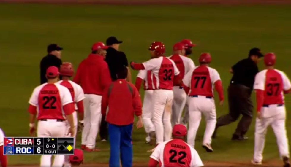 Furious Cuban baseball coaches gang up on, chase umpires off field in game against Americans