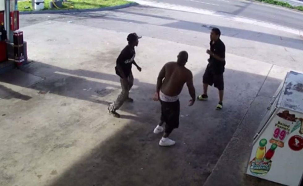 Crooks rip off 12-pack of beer. But store clerk isn't having it and puts up a fight.