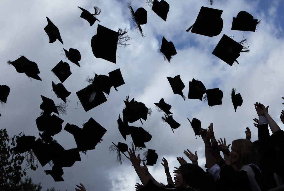 Mother sues school for forcing black daughter to share valedictorian honors with white student