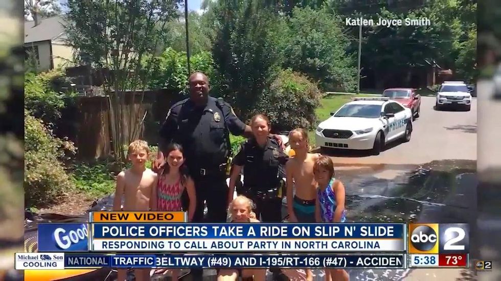 See what happens when cops respond to a complaint about a slip-and-slide