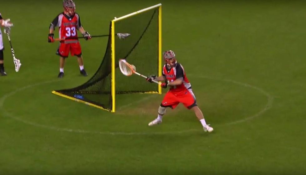 Watch lacrosse goalie score incredible 80-yard shot — and how other goalie helps him out a bit