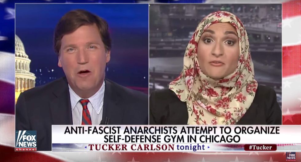 Activist tells Tucker she’s preparing for war with Trump's America — then he corners her with facts