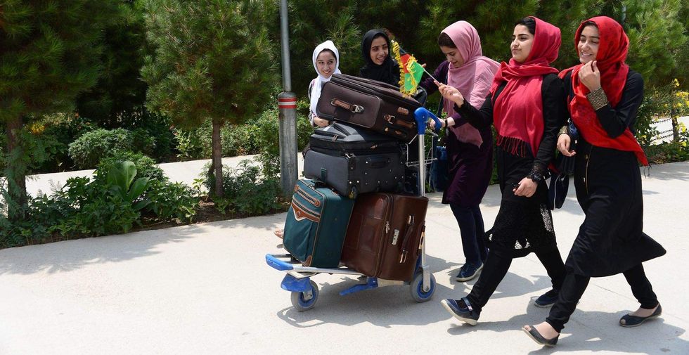 Rejected Afghan girls allowed to travel to US after Trump steps in to help