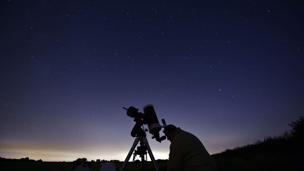 Physicist discusses the novel he wrote to show his own journey of science and faith
