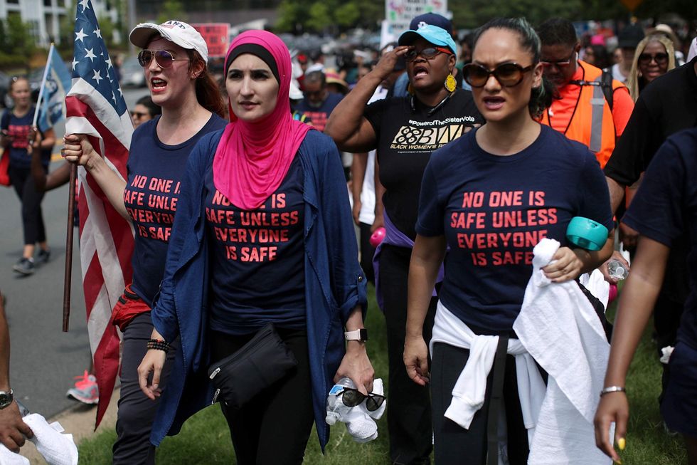 ‘Women’s March’ gets taken to the woodshed for celebrating a cop-killer terrorist wanted by the FBI