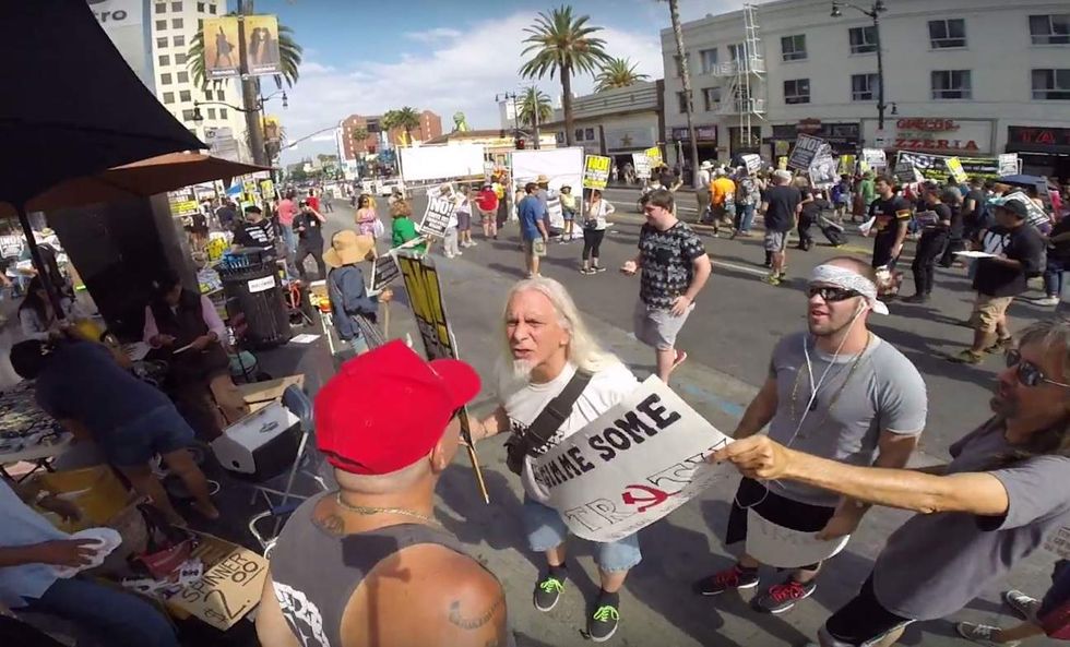 Anti-Trump demonstrator whacks Trump supporter in head with sign — and pays for it, bigly