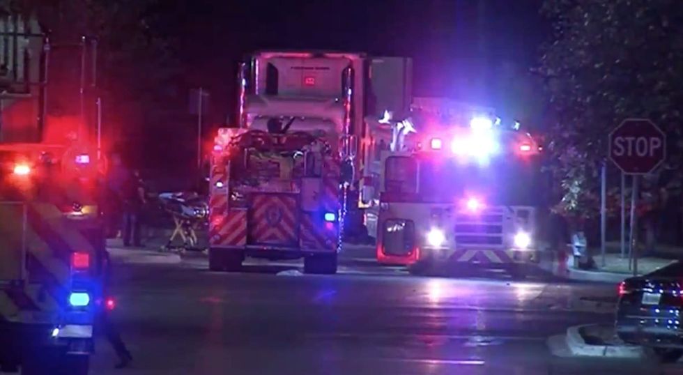 At least 9 dead after dozens found crammed into sweltering trailer in Texas Walmart parking lot