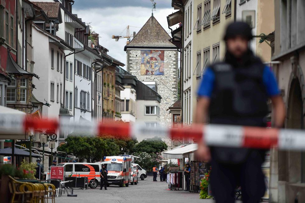Man who allegedly attacked Swiss city with a chainsaw still on the loose