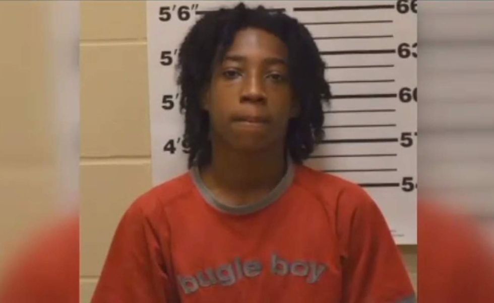 Teen caught on video allegedly spitting on grave of police officer gunned down in line of duty