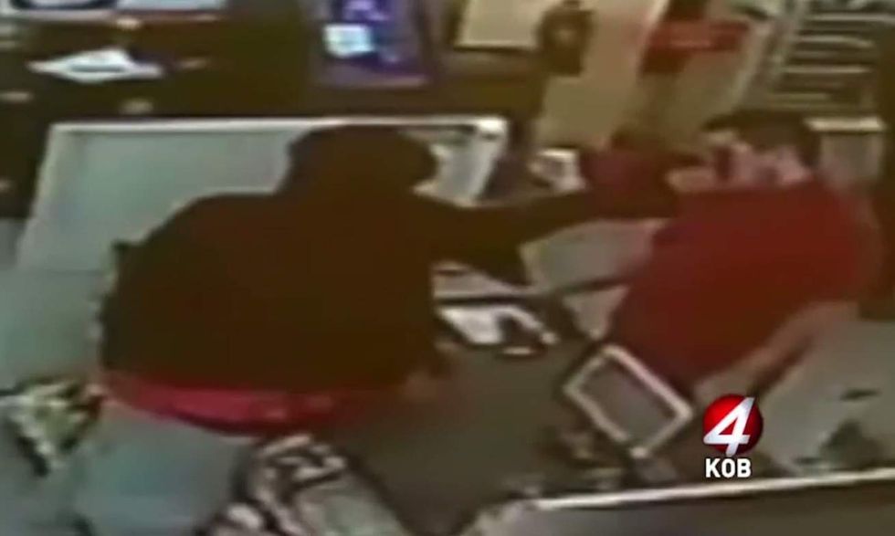Thug holds gun to store clerk's head, steals cash. But after a better view of gun, the tables turn.