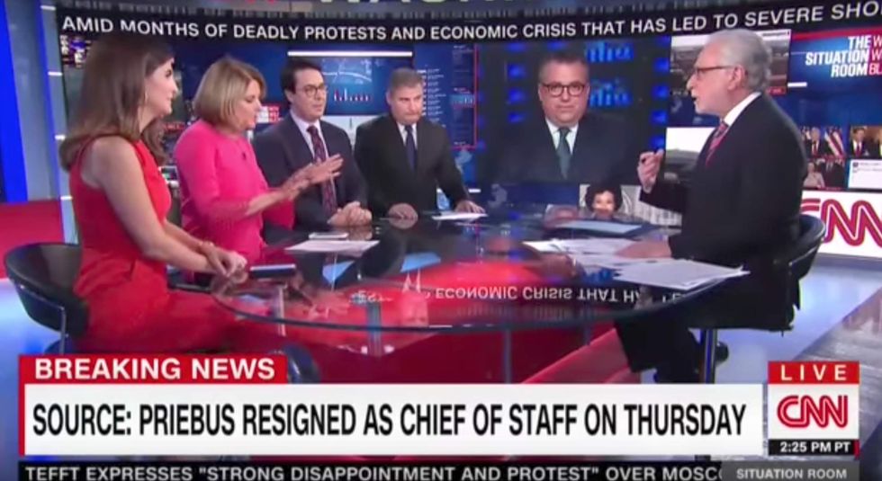 Things quickly get awkward on CNN when Wolf Blitzer scolds a reporter live on air for poor sources