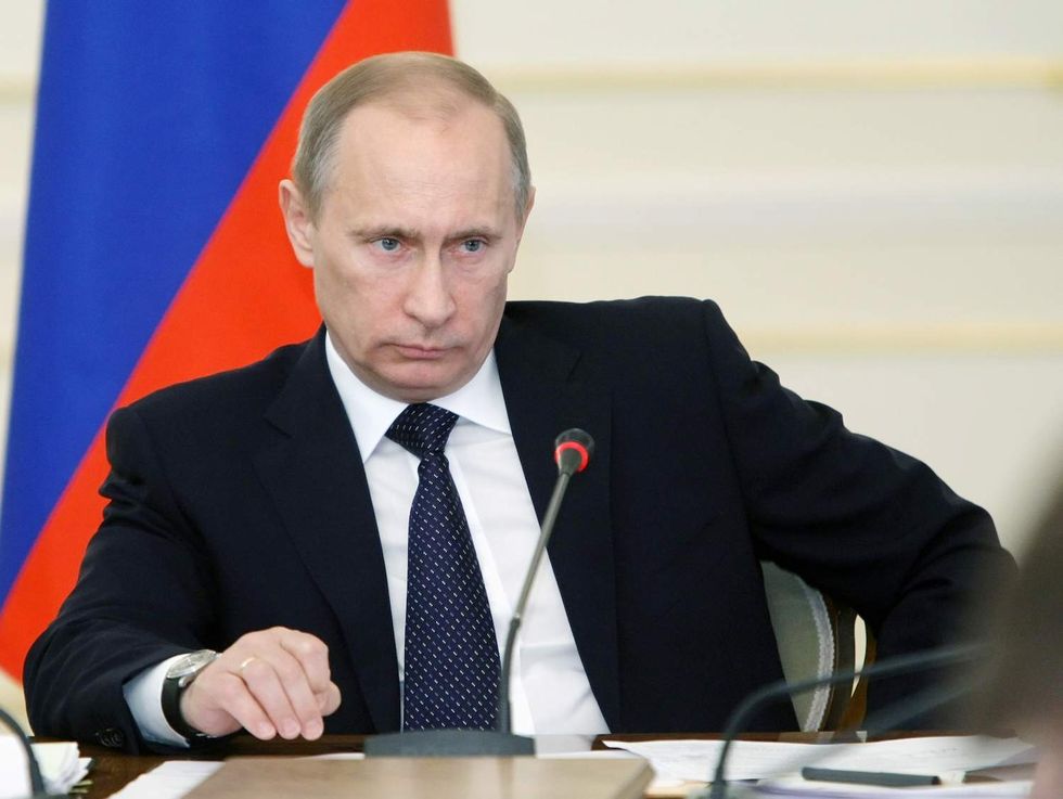 Vladimir Putin expels more than 700 U.S. diplomats from Russia, seizes U.S. compounds