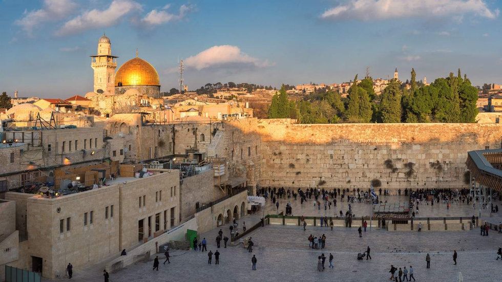 Normal prayer returns to Al-Aqsa Mosque after Israel removes security measures