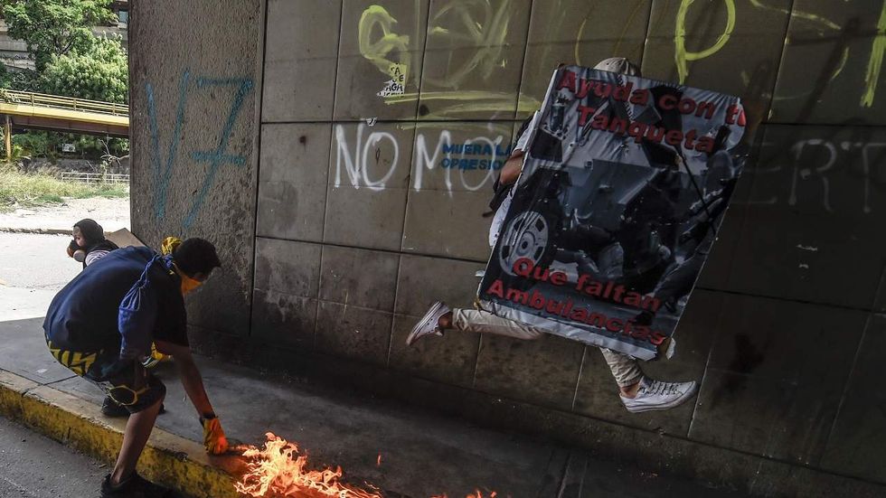 Venezuela is now starving and on the verge of civil war -- what happened?