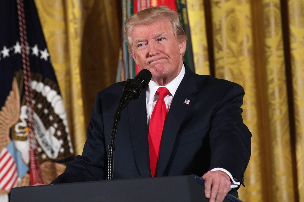 Trump signs Russian sanctions bill, calls it 'seriously flawed