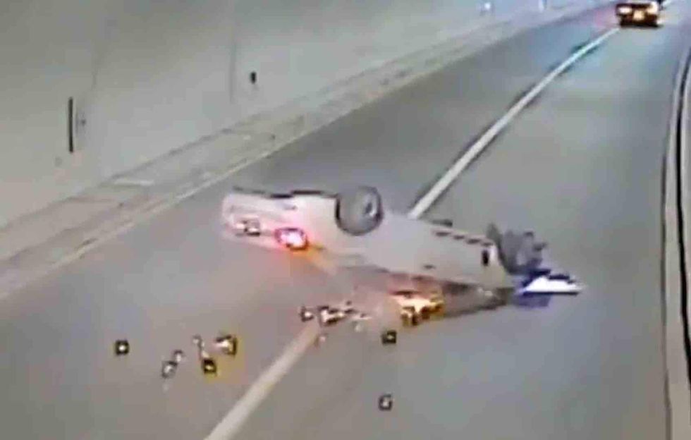 Video shows car slam into tunnel wall, flip over — the truly shocking moment is what happens next