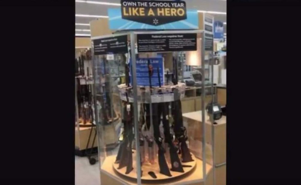Photo in Walmart shows guns displayed as back-to-school items; apologetic execs searching for store