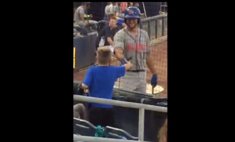 Video: Tim Tebow leaves on-deck circle to greet boy with autism. What he does at bat is just crazy.