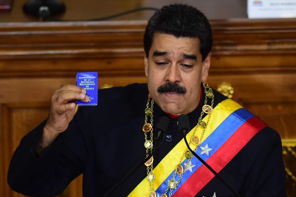 Venezuela's socialist leader offers olive branch to Trump while bashing him