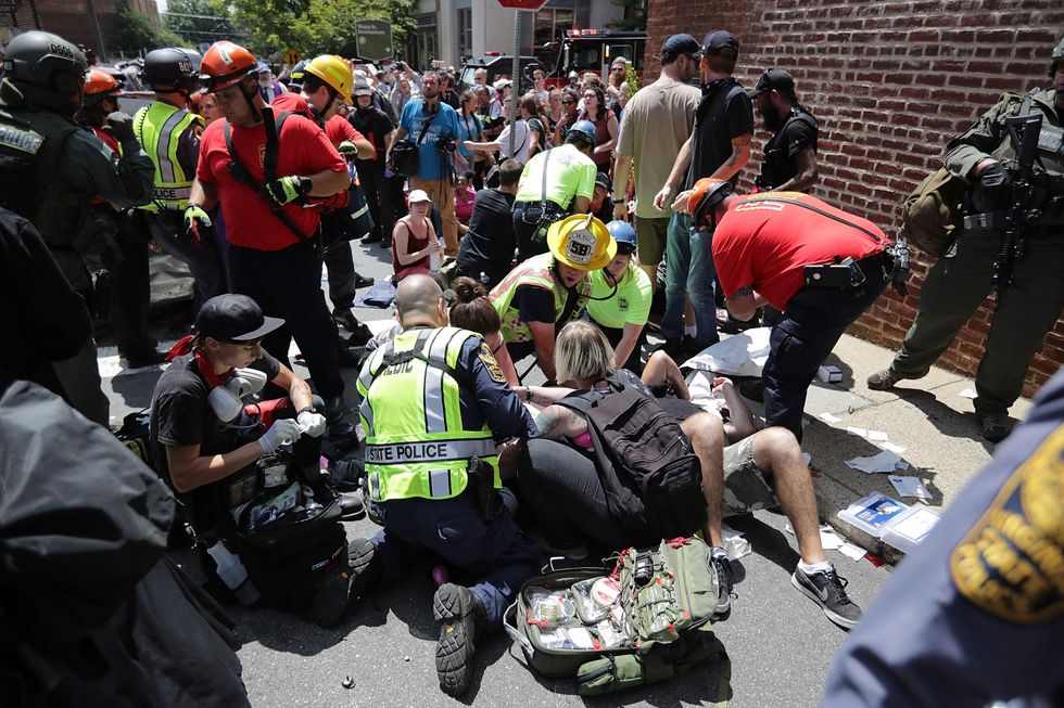 Video shows horrifying moment car plows into crowd at violent protest in Virginia
