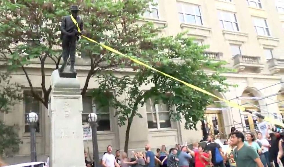 Protesters pull down Confederate statue — and then really show it who's boss
