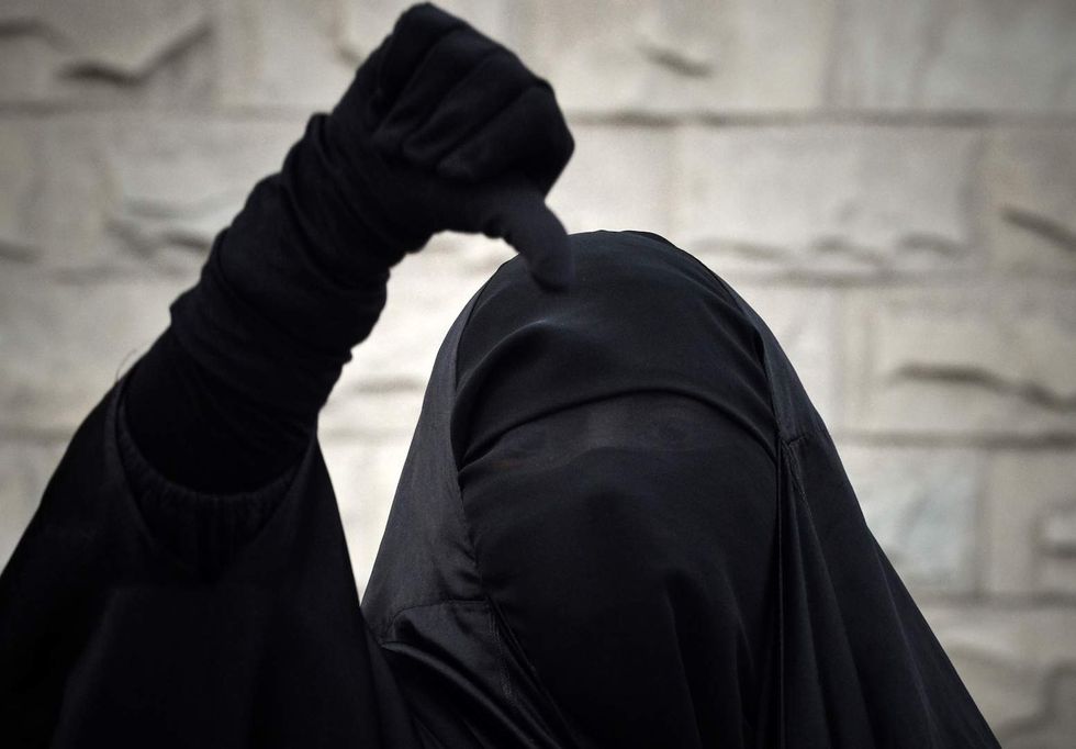 Australian senator causes uproar by wearing Islamic veil to Parliament