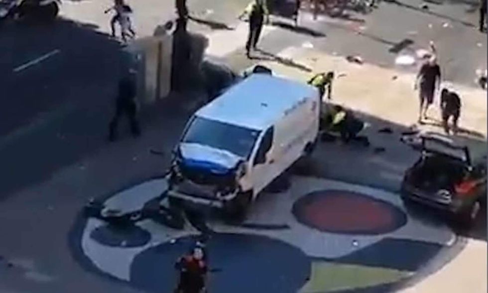 Attacker runs down pedestrians with van in Barcelona, killing 13; dozens more wounded