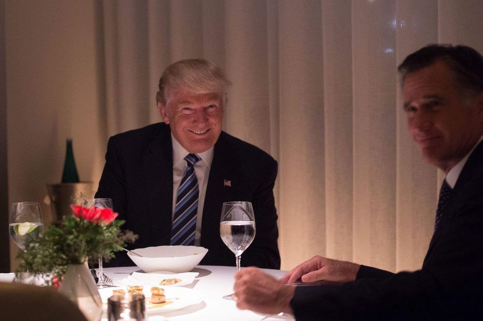 Trump 'caused racists to rejoice' and must apologize, Mitt Romney says