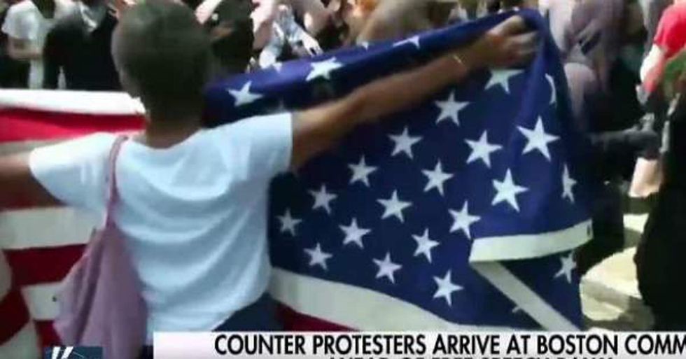 Counter protesters descend on Boston, violence ensues
