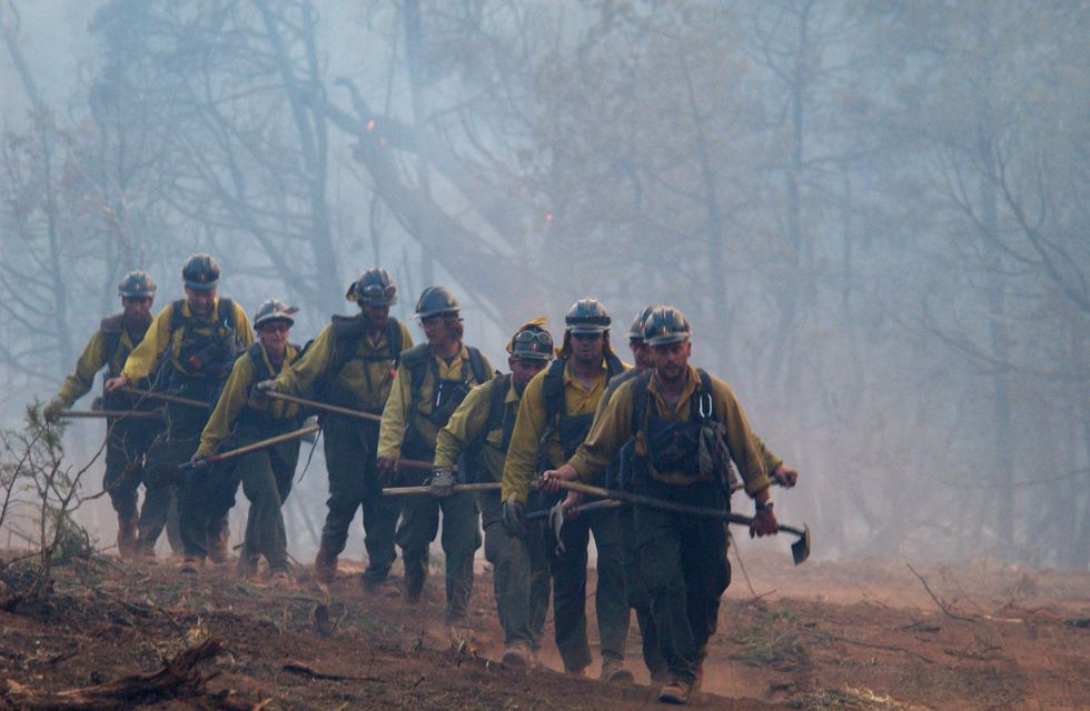 National Guard deploys to help contain massive wildfire in the Pacific Northwest
