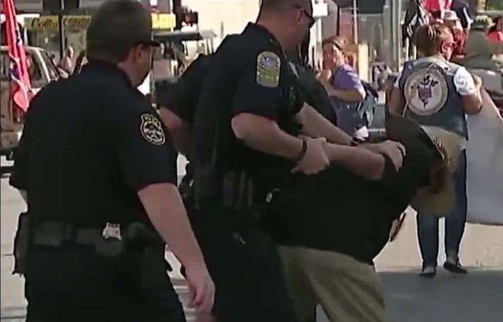 He's charged with pepper-spraying Confederate re-enactors. Here's what he used to do for a living.