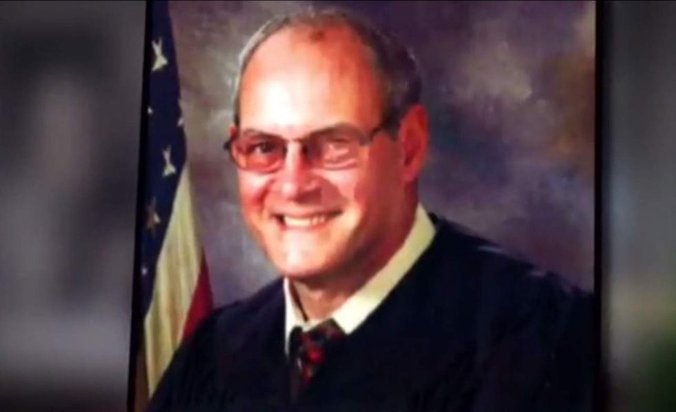 Judge shot in apparent ambush outside courthouse — but he had a gun, too