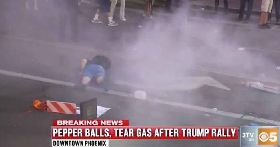 Watch: Anti-Trump protester receives brutal dose of karma after he kicks tear gas at police