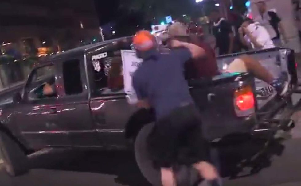 White Antifa protester sucker punches man of color in Phoenix — and check out the sign he's holding