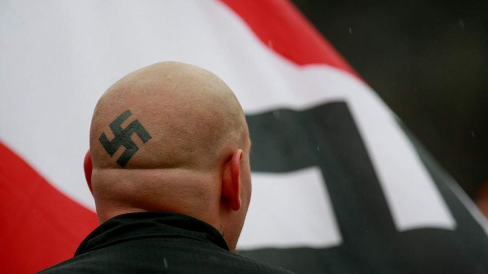 I shouldn't have said that': Confederate flag advocate accidentally lets racial slur slip