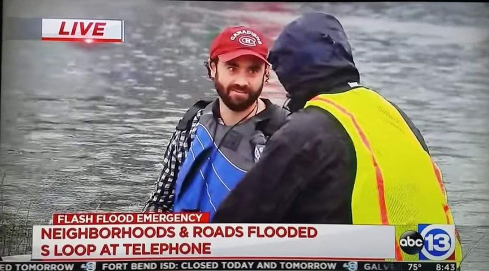 The Lord is always with us': Houston priest kayaks through floodwaters to celebrate mass