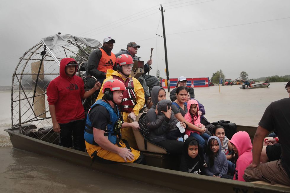 Here are some bright moments from the darkness of Tropical Storm Harvey
