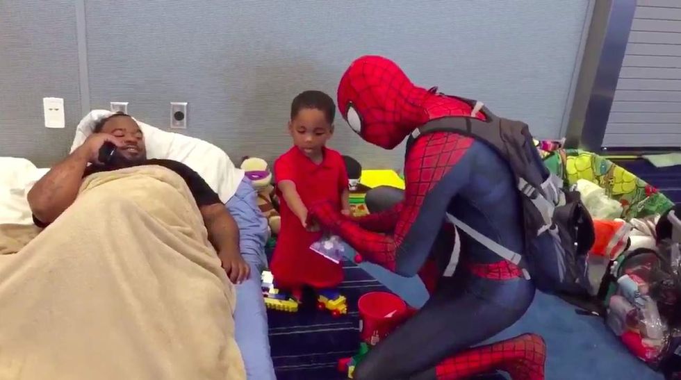 Man dresses up as Spider-Man to cheer up children in Houston hurricane shelter